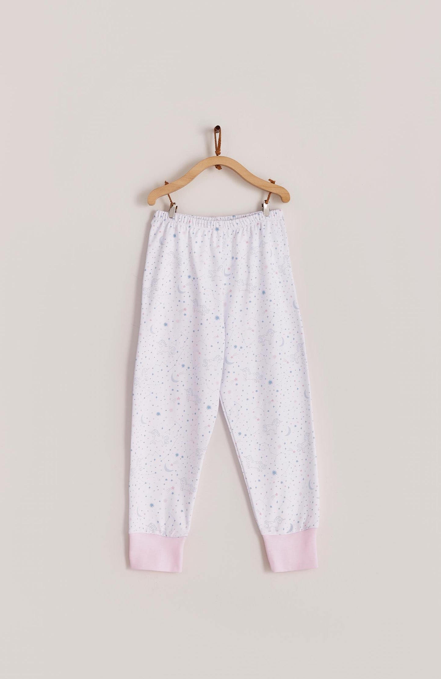 Our full print Unicorn pyjama set is super cute for our little dreamers! This 100% Pima Cotton pyjama is luxuriously soft and comfortable ideal for sleep but also playtime at home. With long sleeves and long pants, it’s perfect for any season, particularly for those kids who can’t keep covered at night. Makes an ideal gift! Colour: White with pink and light-blue details. Composition: 100% Peruvian Pima Cotton. Made in Peru. Machine washable. Safety warning: Keep away from fire.