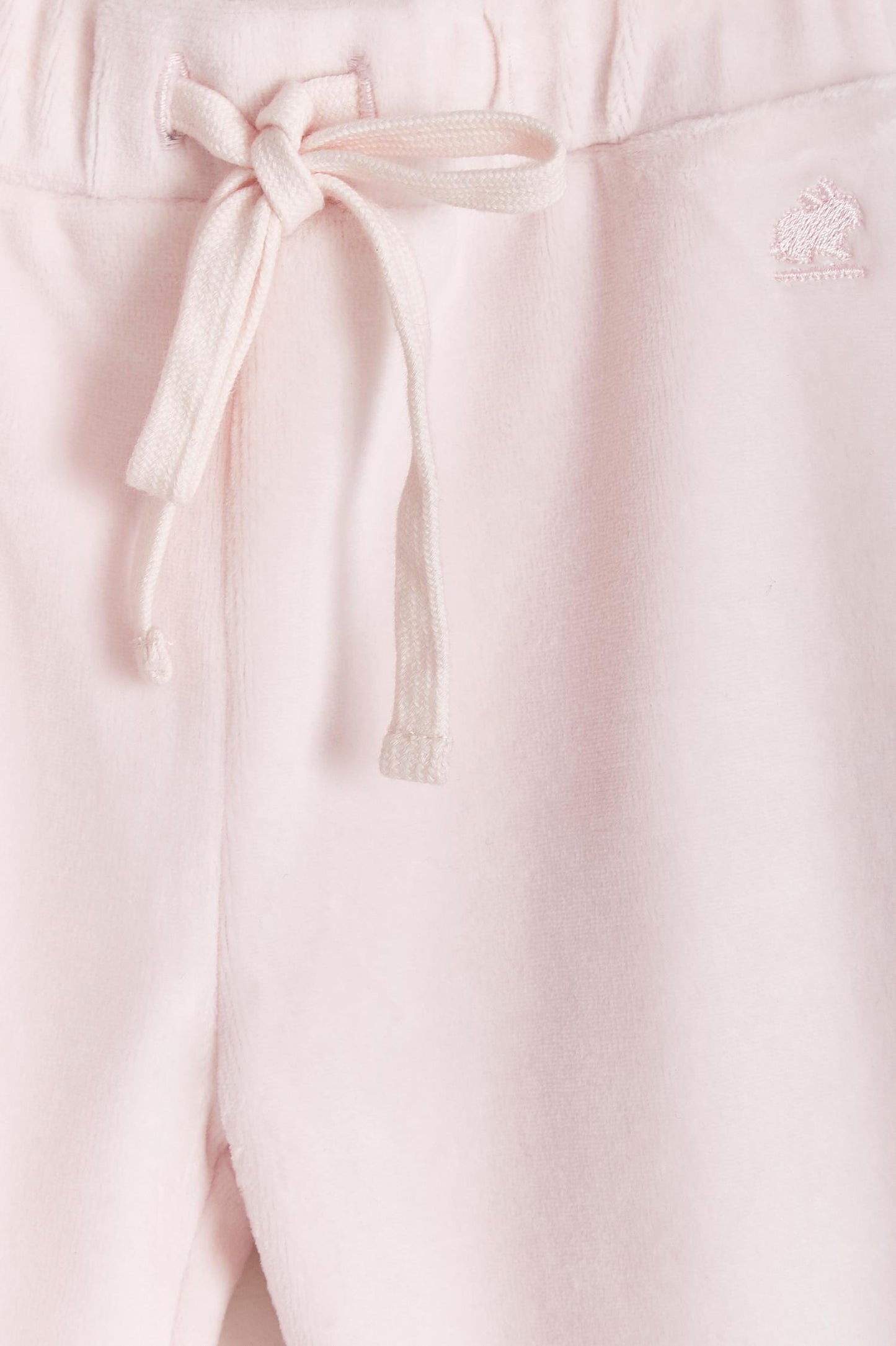 The loveliest baby boy reversible plush pants! Fully lined with Pima cotton. Elasticized waist. Perfect to match with Celine & Bernie hoodie for the ideal winter look! Colour: Pink. Composition: Outer: 85% cotton, 15% polyester. Lining: 100% Pima cotton. Made in Peru. Machine wash cold.