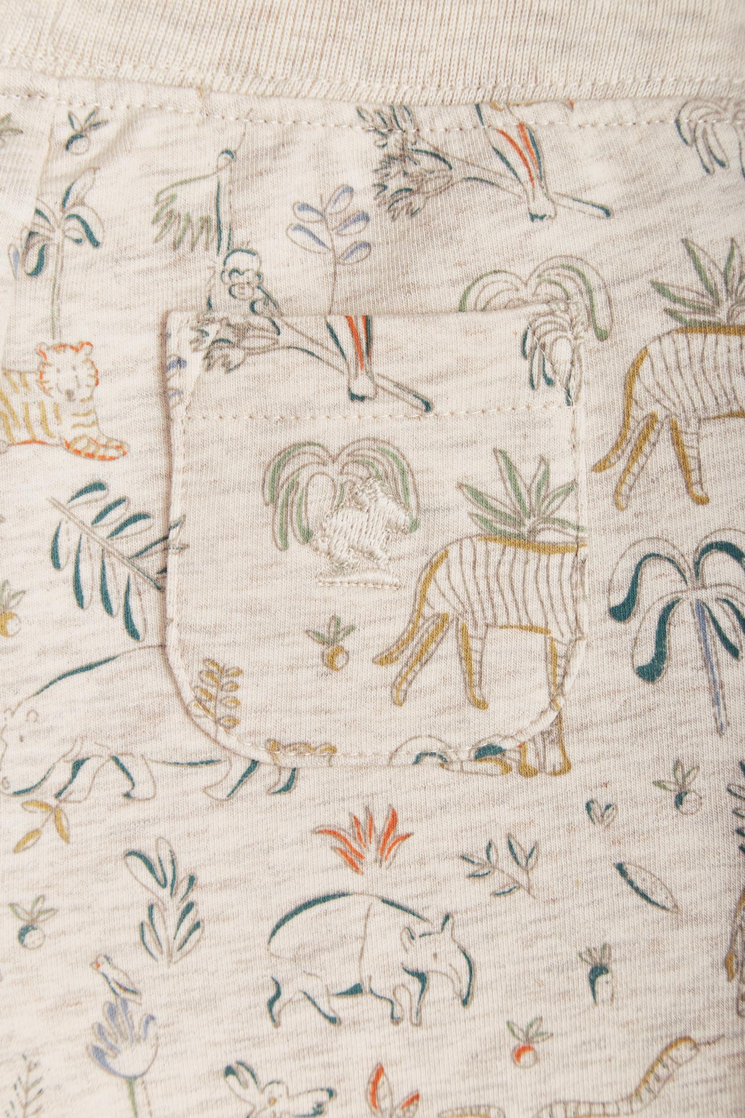 Safari Jogger pants are perfect for everyday! Comfy and stylish for every season, it features an elasticated inner waist and contrasting drawstring to fit. Pockets on the front. Combine it with any of our Pima Colour bodysuits and Safari's jumper for a complete look. Colour: Beige melange with coloured details. Composition: 95% Peruvian Pima cotton, 5% Elastane.  Made in Peru. Machine wash cold.