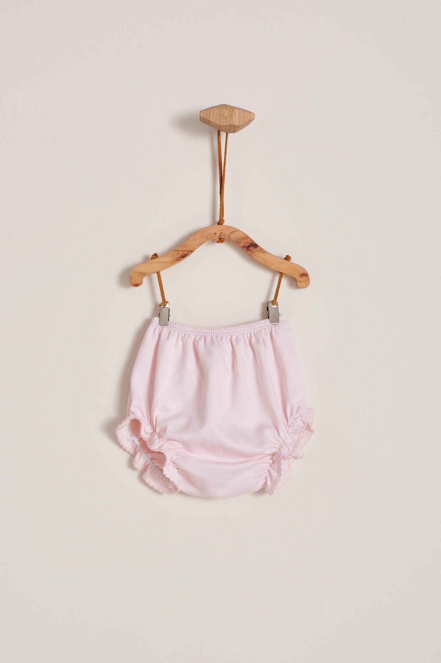 This is definitely the prettiest, effortless and softest 100% Pima Cotton dress for your little girl! The smock at the front makes it super stylish, a must-have for a baby girl spring-summer wardrobe. Comes with matching knickers to cover the nappy. Makes an ideal gift! Colour: Pink Composition: 100% Peruvian Pima Cotton. Made in Peru. Machine washable.