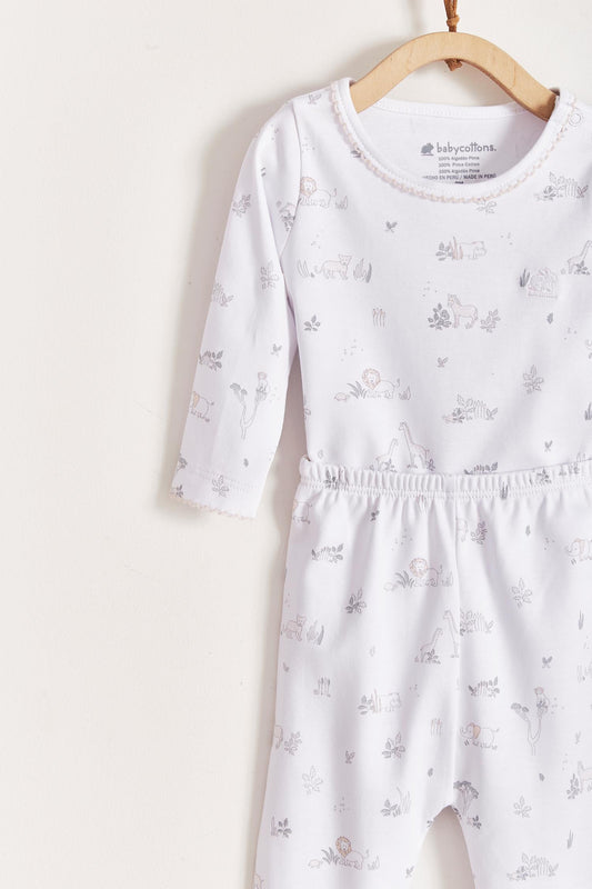* This Mini Safari two-piece Pima cotton set is a must for your baby! * Long-sleeved bodysuit with snaps on the shoulder for a better fit and footless printed pants with cuffs that can be folded to cover the feet, especially the first days of the baby.  Composition: 100% Peruvian Pima Cotton.  Made in Peru. Machine wash cold.