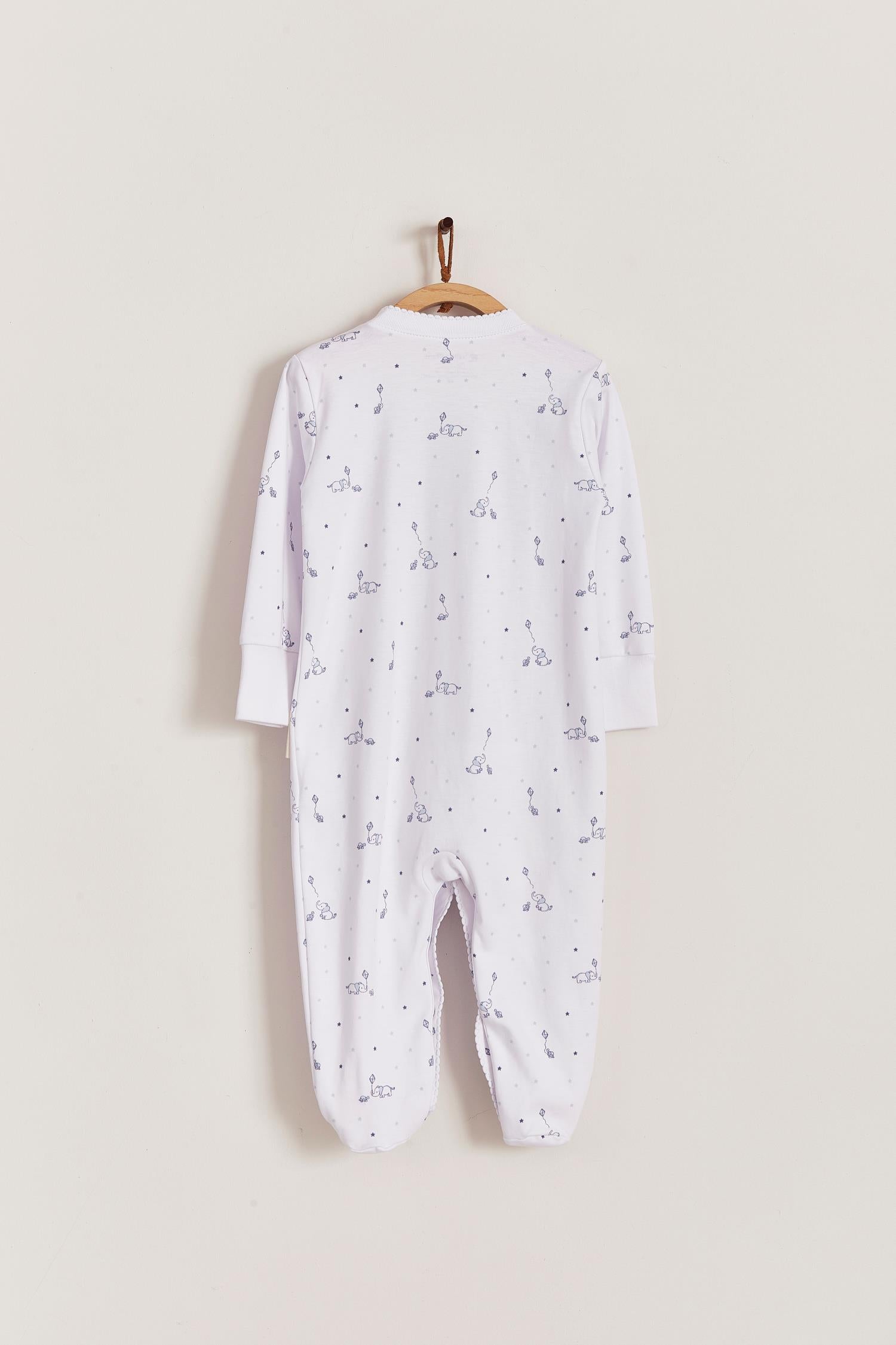 Super soft Pima cotton, long-sleeve, footed pyjama with full snap closure. The pyjama has delicate picot edging and it features our lovely Celine & Bernie print! In size NB, the cuffs give the option of making them mittens for the baby's first days, and can then be folded again. Colour: White with blue Composition: 100% Peruvian Pima Cotton.  Made in Peru. Machine washable. Safety warning: Keep away from fire.