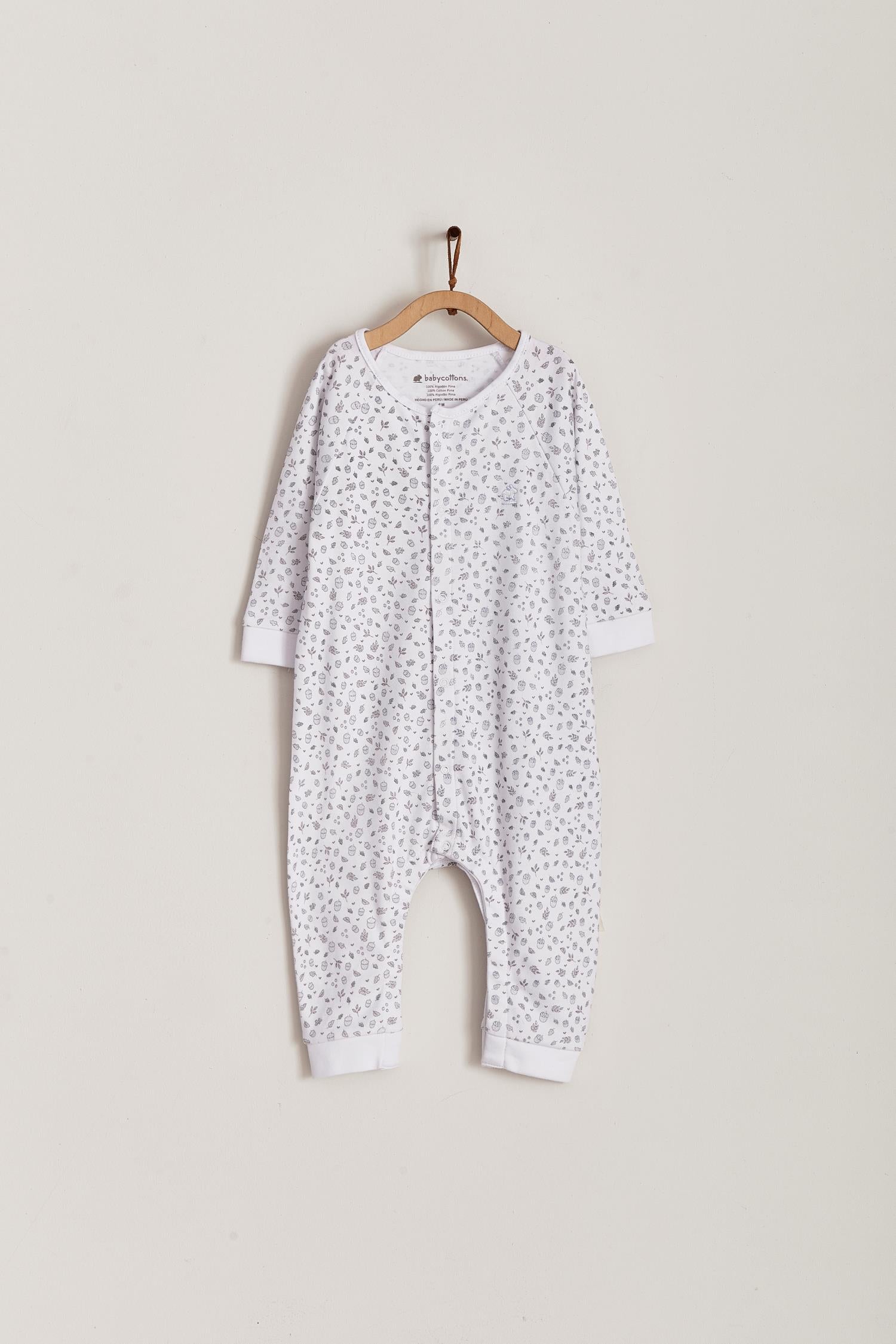 Our Leaves footless pyjama is just as comfy and practical as any other footie. Your little one can grow with it and wear it for a longest time. Soft, cute and delicate, it makes a perfect gift! Colour: White with coloured details. Composition: 100% Peruvian Pima Cotton.  Made in Peru. Machine washable. Safety warning: Keep away from fire.