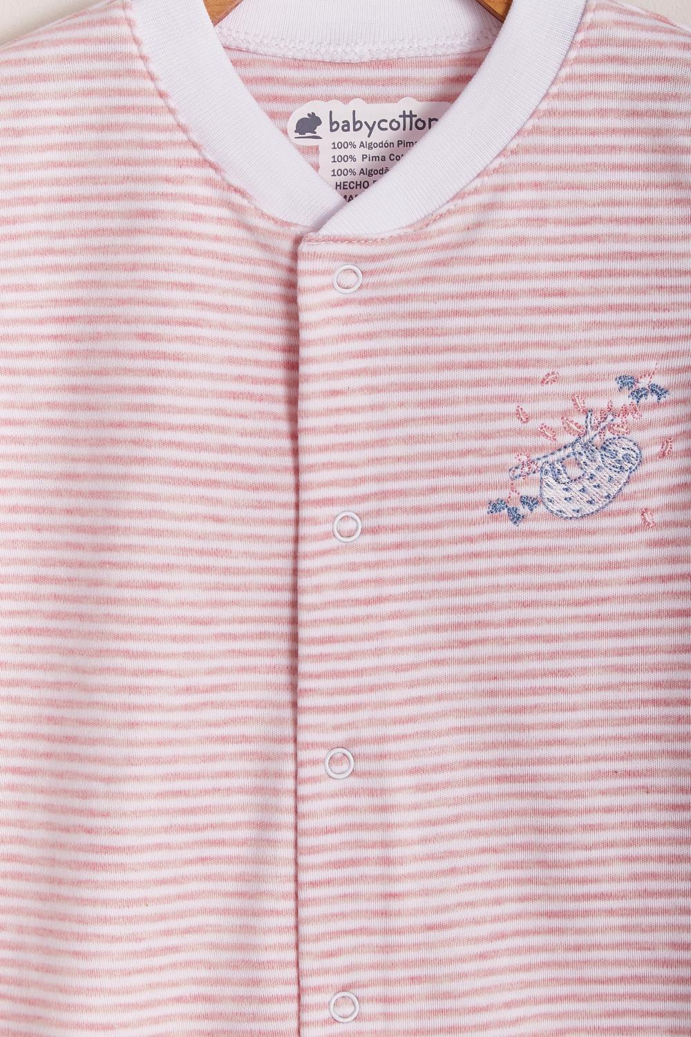 Our striped Naptime short playsuit with full snap closure make it super easy to slip on. Very cool and fresh! Ideal for your baby’s spring/summer wardrobe. Pair it with our Naptime bibs for the perfect look! Colour: White and pink. Composition: 100% Peruvian Pima Cotton.  Made in Peru. Machine washable. Safety warning: Keep away from fire.