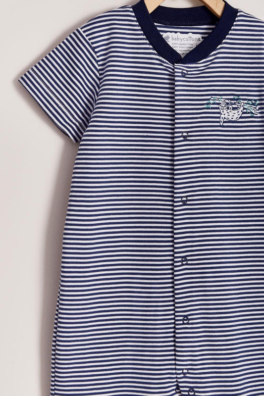Our striped Naptime short playsuit with full snap closure make it super easy to slip on.  Very cool and fresh!  Ideal for your baby’s spring/summer wardrobe. Pair it with our Naptime bibs for the perfect look! Colour: White and blue stripes Composition: 100% Peruvian Pima Cotton.  Made in Peru. Machine washable. Safety warning: Keep away from fire.
