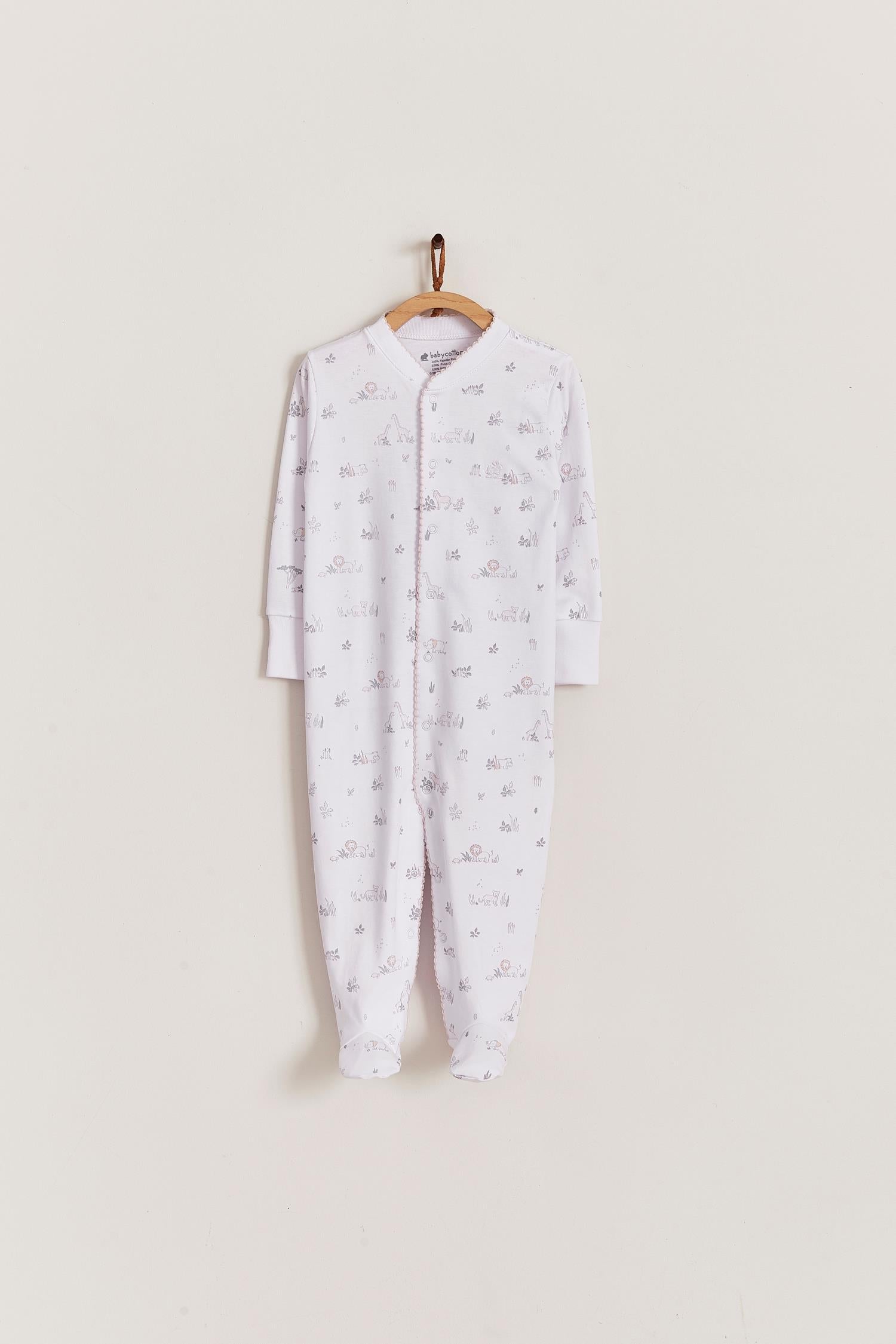 Super soft Pima cotton, long-sleeve, footed pyjama with full snap closure. The pyjama has delicate picot edging and it features our lovely Mini Safari print!  In size NB, the cuffs give the option of making them mittens for the baby's first days, and can then be folded again. Colour: White with light-pink and grey. Composition: 100% Peruvian Pima Cotton.  Made in Peru. Machine washable. Safety warning: Keep away from fire.