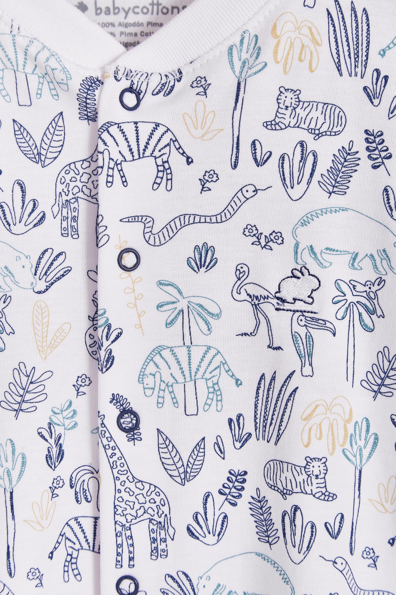 Super soft Pima cotton, long-sleeve, footed pyjama with full snap closure. The pyjama has delicate picot edging and it features an all over Safari print, very cool and fresh! Makes a lovely gift! Colour: White with blue. Composition: 100% Peruvian Pima Cotton.  Made in Peru. Machine washable. Safety warning: Keep away from fire.