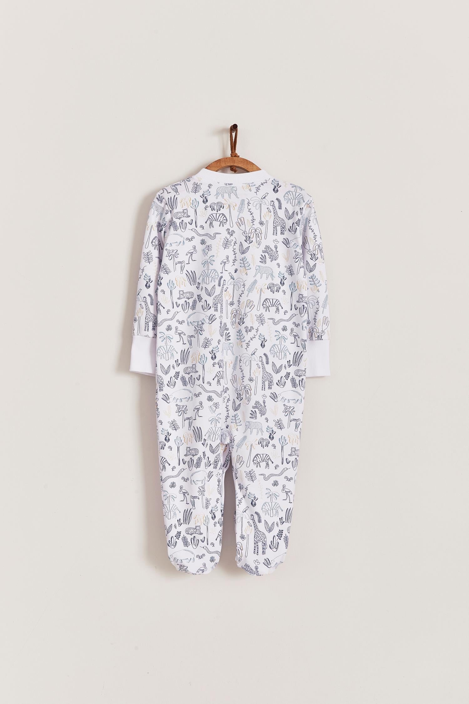 Super soft Pima cotton, long-sleeve, footed pyjama with full snap closure. The pyjama has delicate picot edging and it features an all over Safari print, very cool and fresh! Makes a lovely gift! Colour: White with blue. Composition: 100% Peruvian Pima Cotton.  Made in Peru. Machine washable. Safety warning: Keep away from fire.