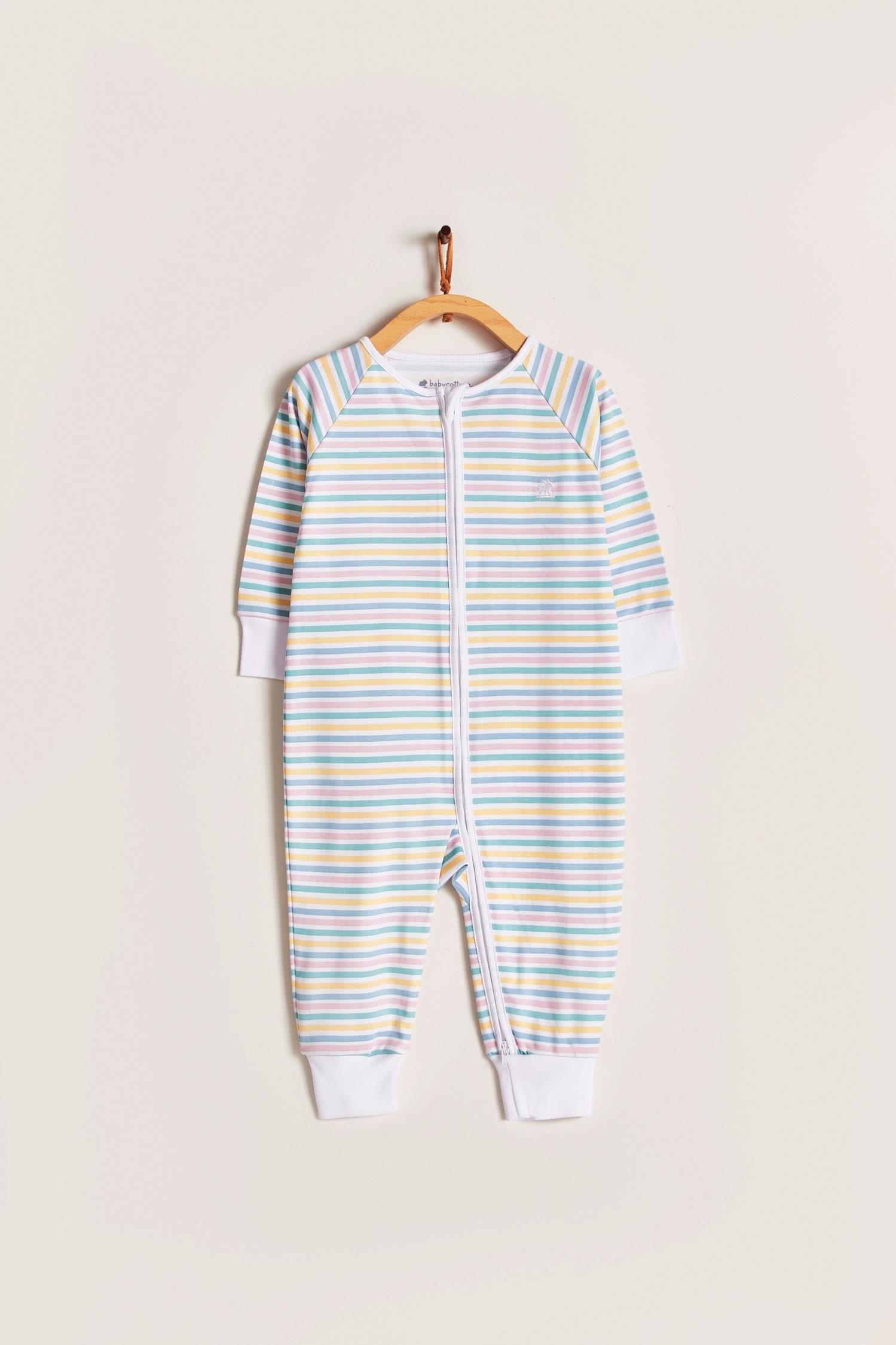 Rainbow Stripes is super cute pyjama full of colours!  Your little one can grow with it and wear it for a longest time. With zipper added for more comfort and practicality. Starting in 12 months all our footies are snug fit. Colour: White with yellow, green and pink stripes. Composition: 100% Peruvian Pima Cotton.  Made in Peru. Machine washable. Safety warning: Keep away from fire.