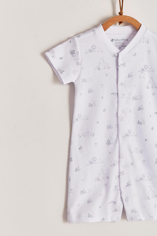 Comfy, cute and super soft, this Mini Safari short romper is the perfect addition to your baby's wardrobe. Very versatile, the romper is perfect for playtime and nap-time! With full snap closure make it super easy to slip on. Match it with our Safari collection to make the perfect gift! Colour: White with grey and light-blue details Composition: 100% Peruvian Pima Cotton.  Made in Peru. Machine washable. Safety warning: Keep away from fire.