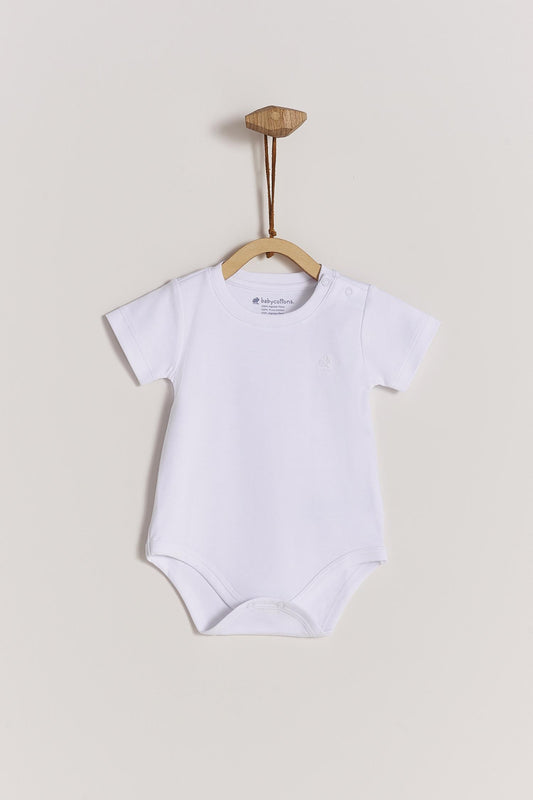 Pima cotton, long-sleeved, t-shirt collar bodysuit. Perfect for a casual look! Poppers on the shoulder and crotch: handy when getting baby dressed. A baby's wardrobe essential! Colour: White. Composition: 100% Peruvian Pima Cotton.  Made in Peru. Machine washable.