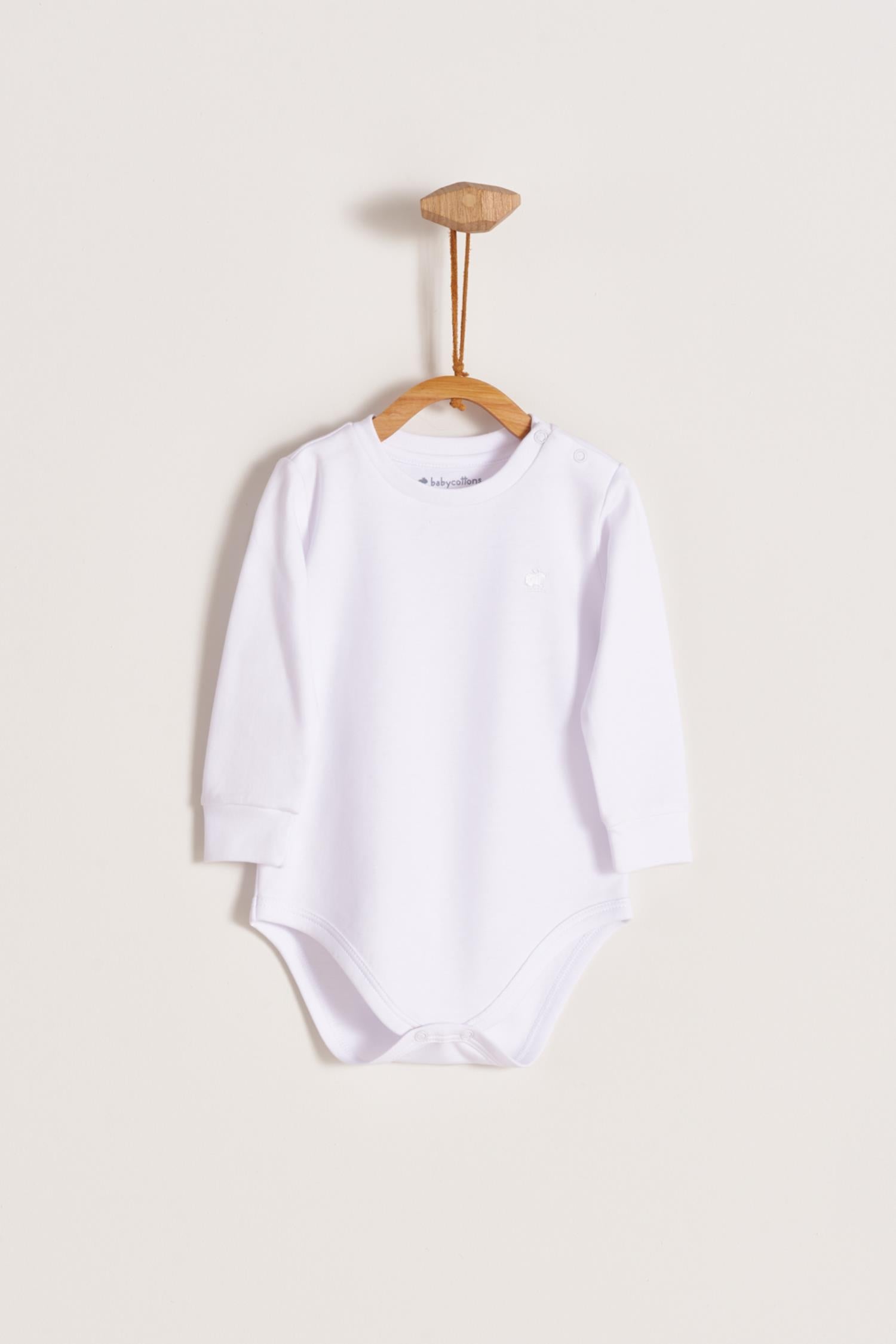 Pima cotton, long-sleeved, t-shirt collar bodysuit. Perfect for a casual look! Poppers on the shoulder and crotch: handy when getting baby dressed. A baby's wardrobe must-have available in a range of colours.  Colour: White. Composition: 100% Peruvian Pima Cotton.  Made in Peru. Machine washable.