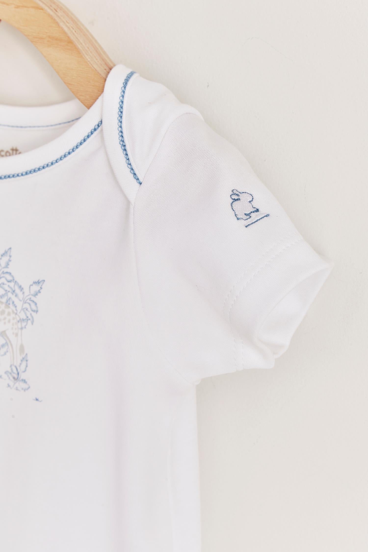 This beautiful short sleeve bodysuit from our Colette & Joa collection is made with the softest Pima Cotton.  Perfect for a playtime occasion.  Pair it with any of our sweatpants or overalls for the perfect look. Composition: 100% Peruvian Pima Cotton.  Made in Peru.  Machine washable.