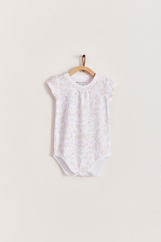 This beautiful short sleeve bodysuit featuring a full print of our Mini Safari collection, including lovely tigers, giraffes, birds and more little animals is made with the softest Pima Cotton. Perfect for a playtime occasion! Pair it with any of our sweatpants or overalls for the perfect look. Colour: White with pink and mustard details Composition: 100% Peruvian Pima Cotton.  Made in Peru.  Machine washable.