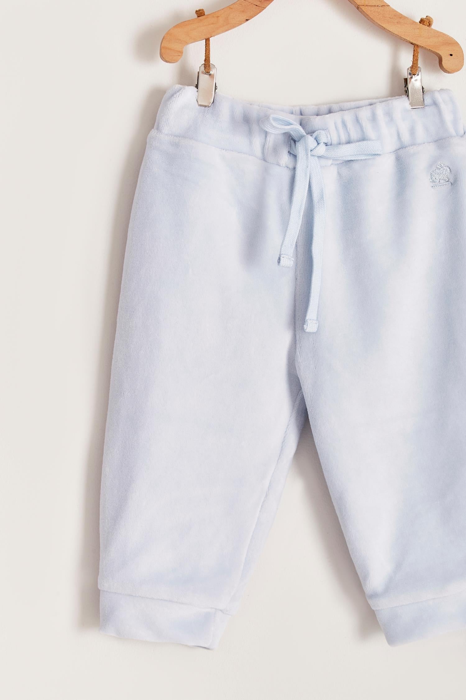 The loveliest baby boy reversible plush pants!  Fully lined with Pima cotton. Elasticized waist.  Perfect to match with Celine & Bernie hoodie.  Colour: Light-blue. Composition: Outer: 85% cotton, 15% polyester. Lining: 100% Pima cotton.  Made in Peru. Machine wash cold. 