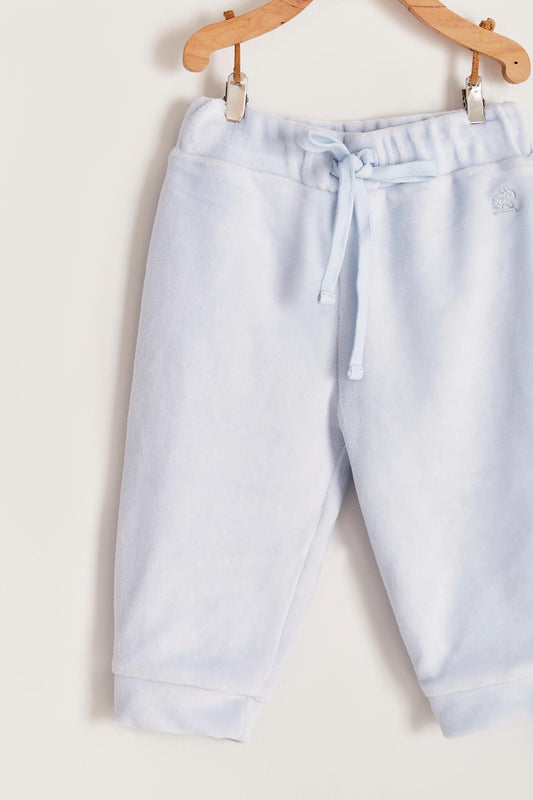 The loveliest baby boy reversible plush pants!  Fully lined with Pima cotton. Elasticized waist.  Perfect to match with Celine & Bernie hoodie.  Colour: Light-blue. Composition: Outer: 85% cotton, 15% polyester. Lining: 100% Pima cotton.  Made in Peru. Machine wash cold. 