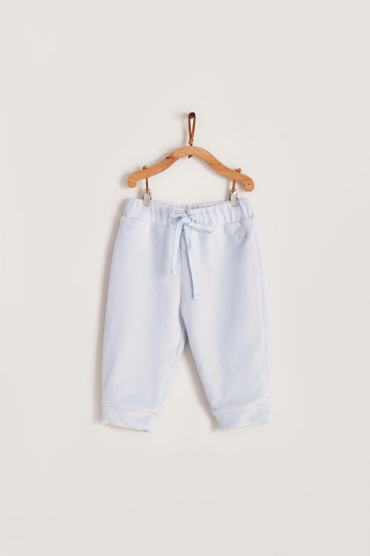 The loveliest baby boy reversible plush pants!  Fully lined with Pima cotton. Elasticized waist.  Perfect to match with Celine & Bernie hoodie.  Colour: Light-blue. Composition: Outer: 85% cotton, 15% polyester. Lining: 100% Pima cotton.  Made in Peru. Machine wash cold. 