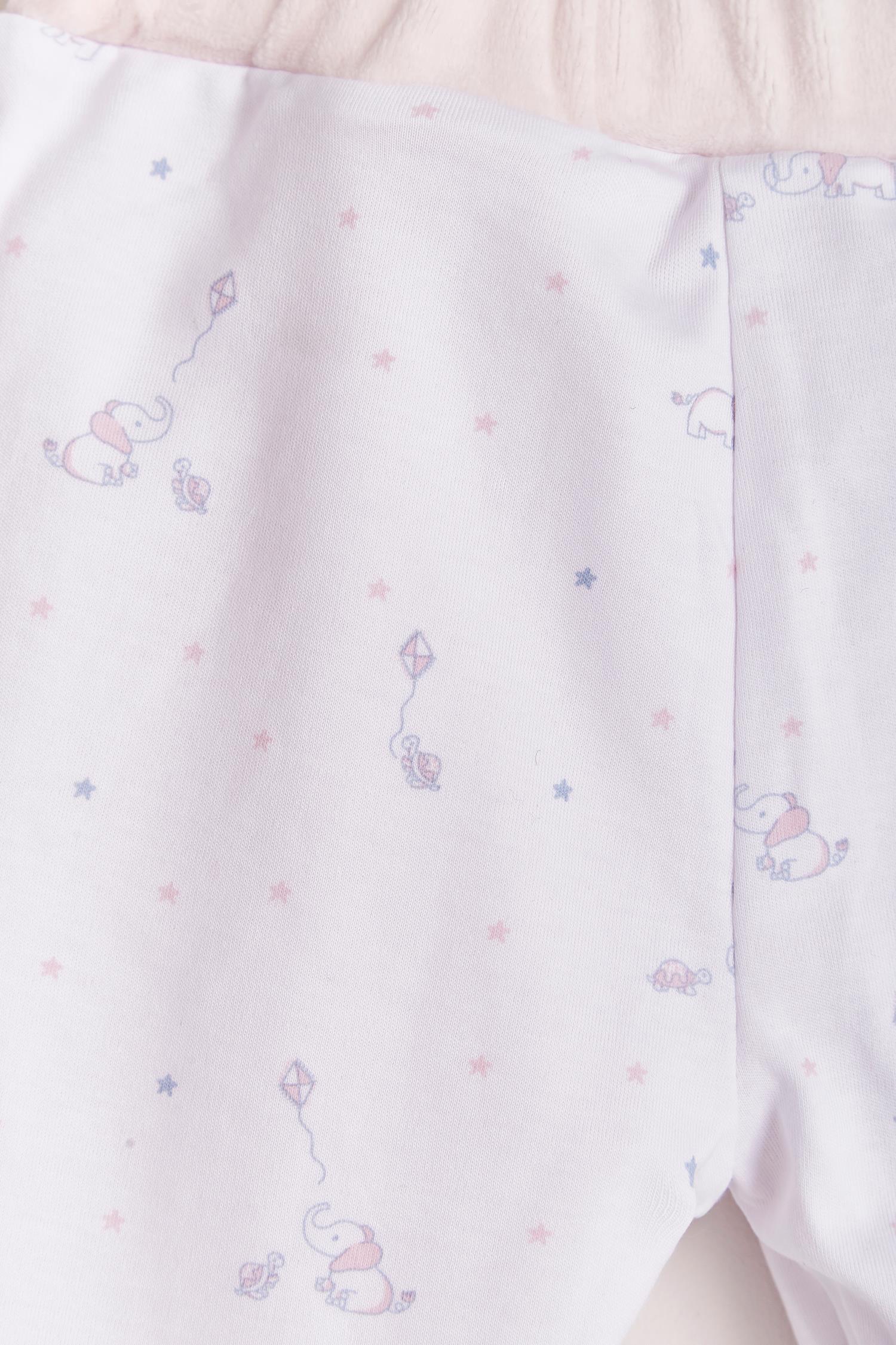 The loveliest baby boy reversible plush pants! Fully lined with Pima cotton. Elasticized waist. Perfect to match with Celine & Bernie hoodie for the ideal winter look! Colour: Pink. Composition: Outer: 85% cotton, 15% polyester. Lining: 100% Pima cotton.  Made in Peru. Machine wash cold.