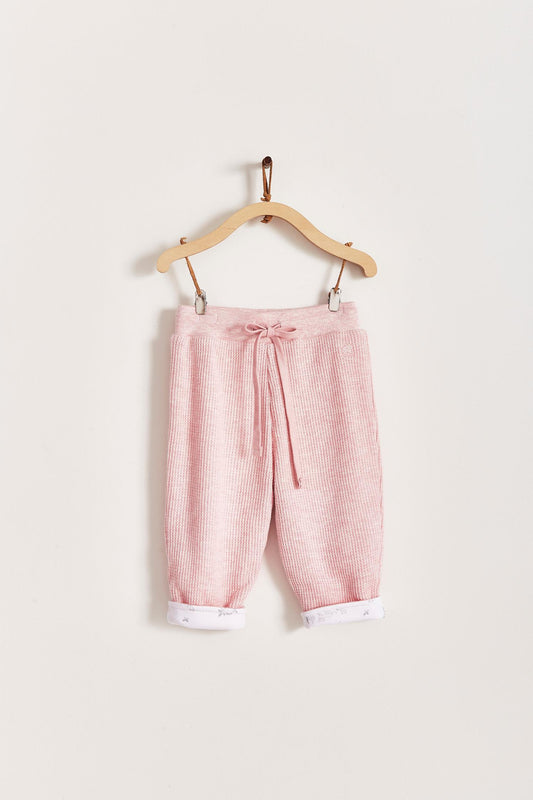 Mini Safari Waffle pants are super cute, soft and comfortable for our babies. Lined in 100% Pima cotton inside, with our beautiful Mini Safari print; outside is one-colour waffle styled.  Combine it with our mini safari waffle cardigan, and mini safari bodysuit for a complete look! Colour: Pink. Composition: 100% Peruvian Pima cotton.  Made in Peru. Machine wash cold. 