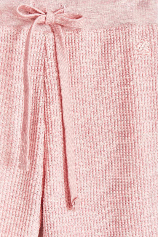 Mini Safari Waffle pants are super cute, soft and comfortable for our babies. Lined in 100% Pima cotton inside, with our beautiful Mini Safari print; outside is one-colour waffle styled.  Combine it with our mini safari waffle cardigan, and mini safari bodysuit for a complete look! Colour: Pink. Composition: 100% Peruvian Pima cotton.  Made in Peru. Machine wash cold. 