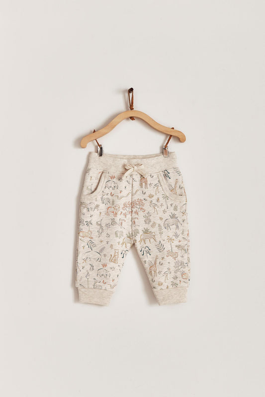 Safari Jogger pants are perfect for everyday! Comfy and stylish for every season, it features an elasticated inner waist and contrasting drawstring to fit. Pockets on the front. Combine it with any of our Pima Colour bodysuits and Safari's jumper for a complete look. Colour: Beige melange with coloured details. Composition: 95% Peruvian Pima cotton, 5% Elastane.  Made in Peru. Machine wash cold. 