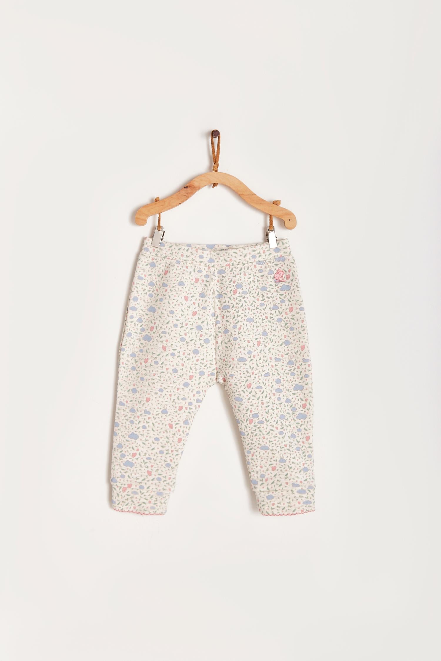 Super soft and comfortable baby leggings for everyday wear. Our Fall in Love print makes it especially cute for your little pretty baby! Combine it with any of our bodysuits and Fall in Love jumper for a complete look! Colour: Beige melange with pink and light-blue details. Composition: 95% Peruvian Pima cotton, 5% Elastane.  Made in Peru. Machine wash cold. 