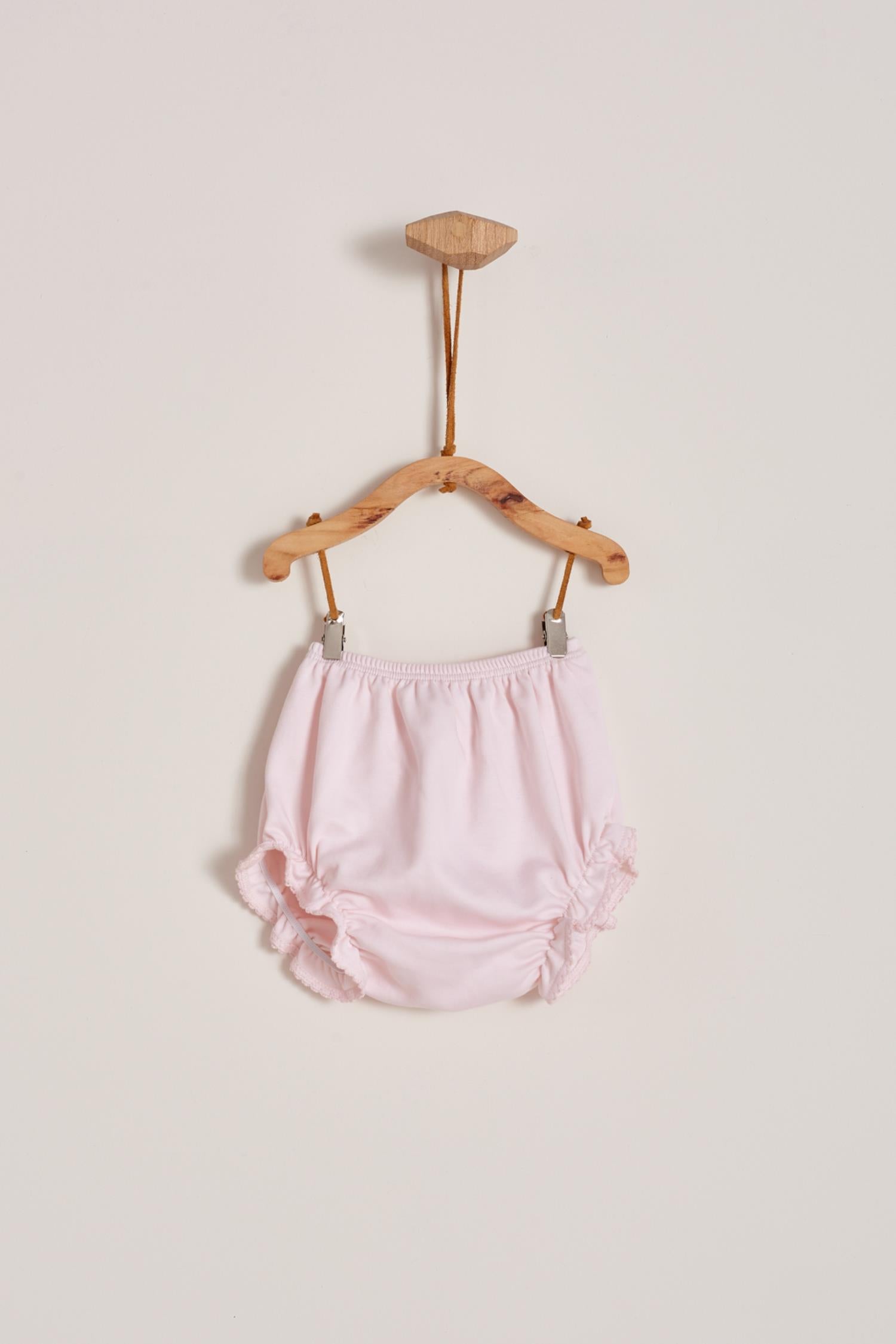 This is definitely the prettiest, effortless and softest 100% Pima Cotton dress for your little girl! The smock at the front makes it super stylish, a must-have for a baby girl spring-summer wardrobe. Comes with matching knickers to cover the nappy.  Makes an ideal gift! Colour: Pink Composition: 100% Peruvian Pima Cotton.  Made in Peru. Machine washable.