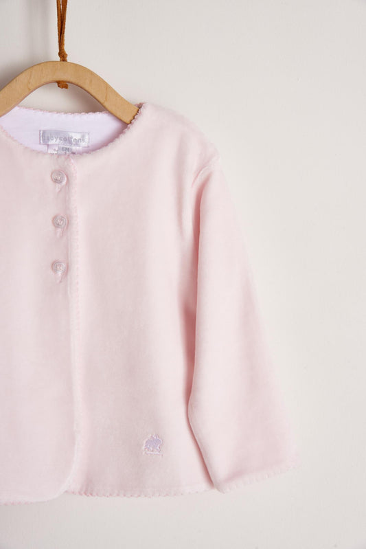Super soft plush fabric that keeps your baby comfortable and warm. A perfect cardigan for those chilly nights! Featuring a delicate embroidered lining along the neckline and 3 buttons at the top. Pair it with our plush pants for the sweetest look and perfect gift! Colour: Pink. Composition: 100% Peruvian Pima cotton , 15% Polyester. Made in Peru. Machine washable.