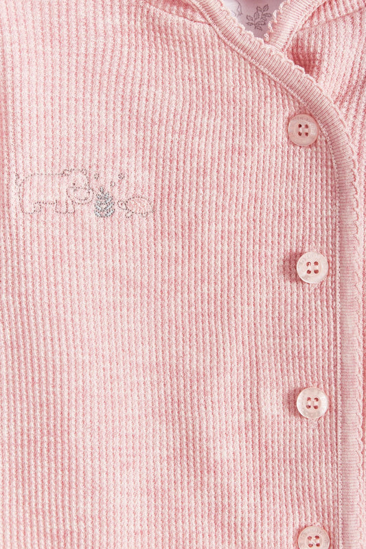 Ideal for winter, Mini Safari Waffle cardigan is super cute and comfortable for babies. Fully lined with printed Pima cotton, outside is one-color waffle styled. Combine it with our mini safari waffle pants, and mini safari bodysuit for a complete look. Colour: Pink. Composition: 100% Peruvian Pima cotton  Made in Peru. Machine washable.