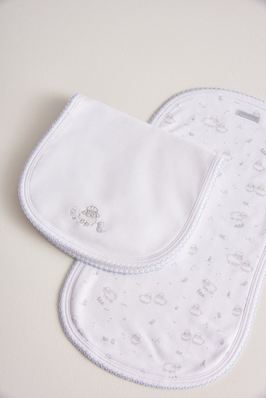 Essential set of two cute and ultra soft burp cloths, a must have for your little one with our lovely Fluffy Sheep embroidered! Two Pima cotton burp cloths of approx. 18 cm x 36 cm designed with picot edging.  Reverse side has absorbent towel for extra comfort. This product is a MUST have! Composition: 100% Pima Cotton.  Made in Peru.  Machine washable.