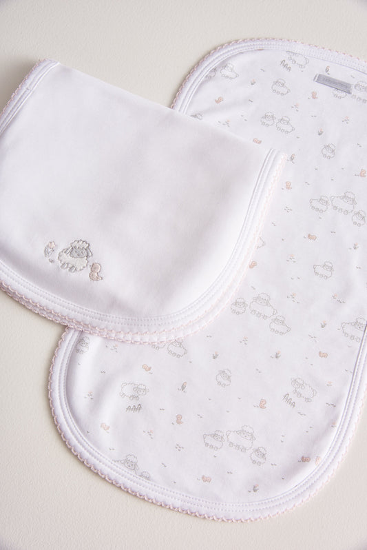 Essential set of two cute and ultra soft burp cloths, a must have for your little one with our lovely Fluffy Sheep embroidered! Two Pima cotton burp cloths of approx. 18 cm x 36 cm designed with picot edging.  Reverse side has absorbent towel for extra comfort. This product is a MUST have! Composition: 100% Pima Cotton.  Made in Peru.  Machine washable.