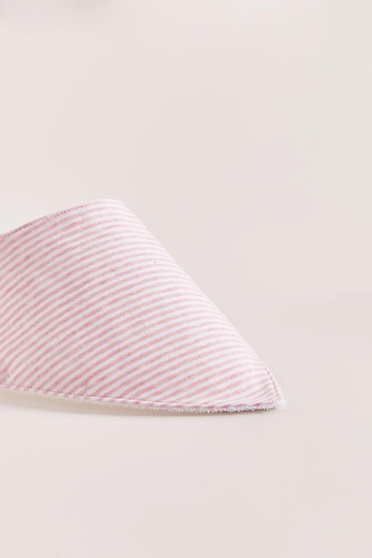 This set of 2 bandana style bibs is perfect to fit your baby from 0 to 6 months. It not only helps to keep teething baby dry and neat, but is also versatile enough for any daily outfit. One comes striped, and the second one comes with full print of the collection The reverse side has an absorbent towel for an extra comfort. Composition: 100% Peruvian Pima Cotton.  Made in Peru.  Machine washable. 