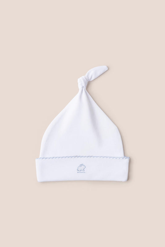 Made with the softest Pima cotton, this hat is a perfect addition to your newborn’s wardrobe.  The lightweight fitted hat will keep your little one comfy and warm.  This knot beanie matches perfectly with all our collections. Composition: 100% Peruvian Pima Cotton.  Made in Peru. Machine washable. 