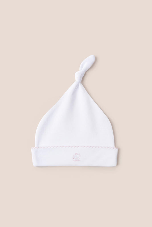 Made with the softest Pima cotton, this hat is a perfect addition to your newborn’s wardrobe.  The lightweight fitted hat will keep your little one comfy and warm.  This knot beanie matches perfectly with all our collections. Composition: 100% Peruvian Pima Cotton.  Made in Peru. Machine washable. 
