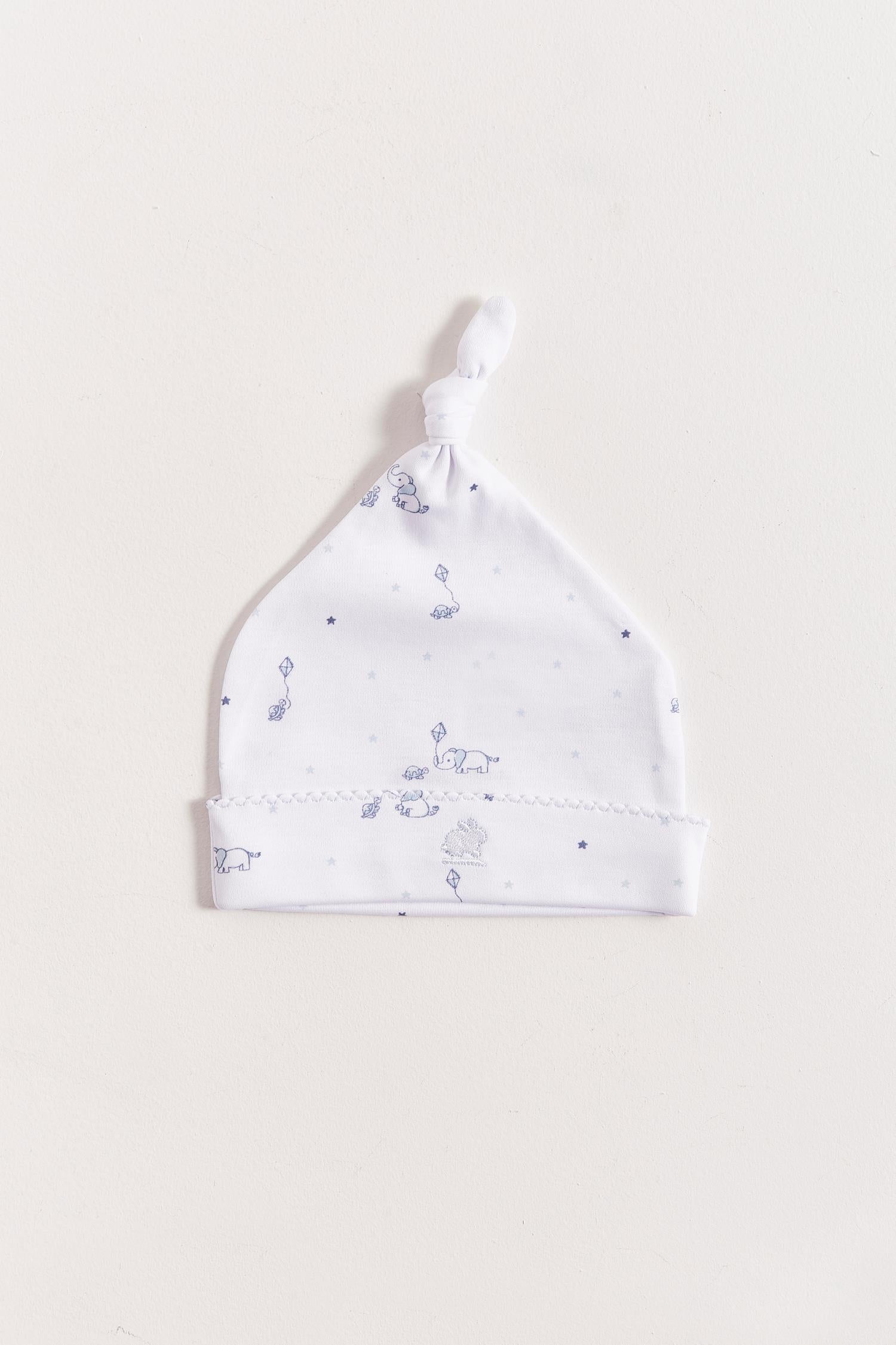 Made with the softest Pima cotton, this hat is a perfect addition to your newborn’s wardrobe.  The lightweight fitted hat will keep your little one comfy and warm.  This knot beanie features a cute print that matches perfectly with our Celine & Bernie collection. Composition: 100% Peruvian Pima Cotton.  Made in Peru. Machine washable.    