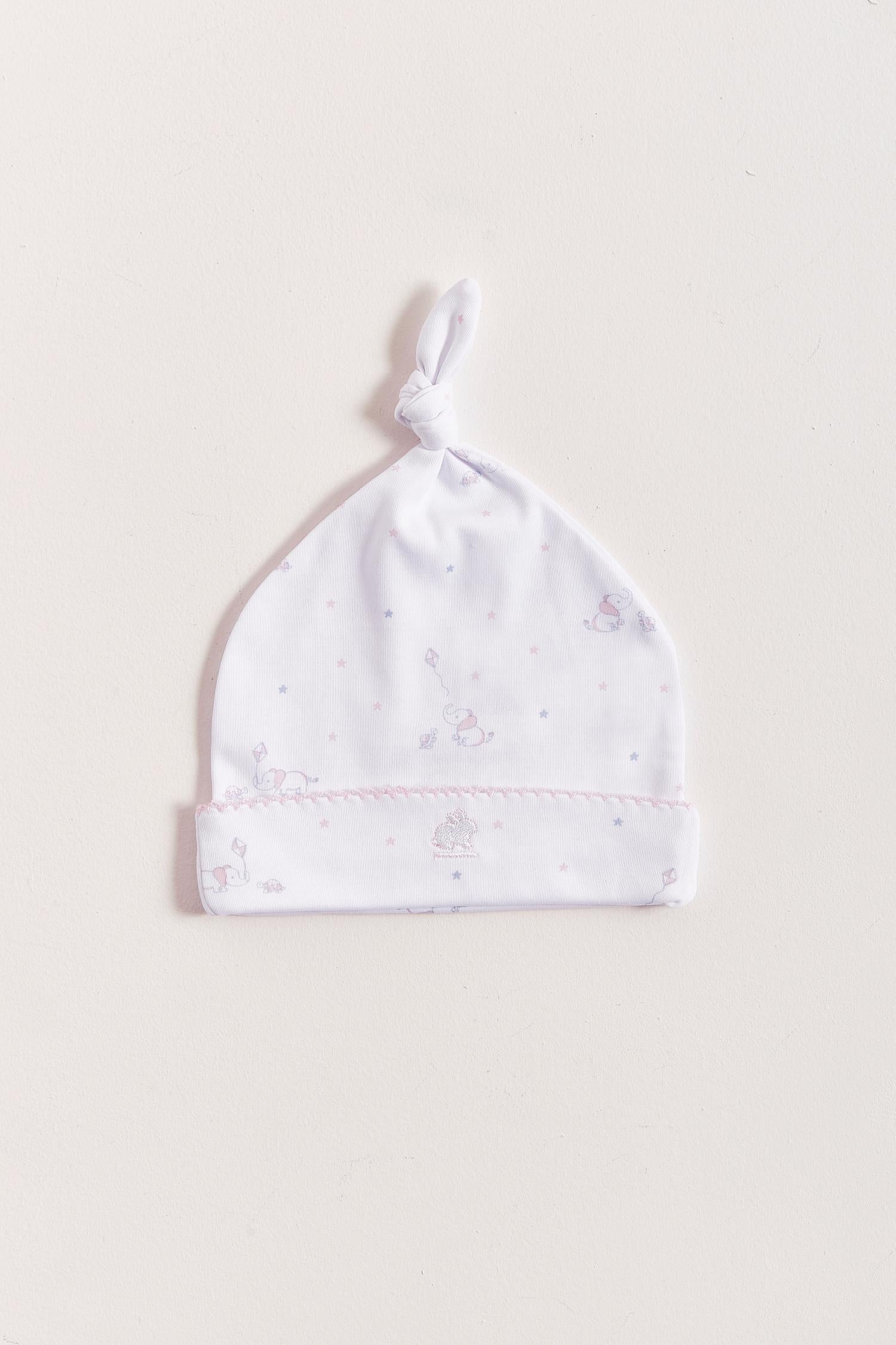 Made with the softest Pima cotton, this hat is a perfect addition to your newborn’s wardrobe.  The lightweight fitted hat will keep your little one comfy and warm.  This knot beanie features a cute print that matches perfectly with our Celine & Bernie collection. Composition: 100% Peruvian Pima Cotton.  Made in Peru. Machine washable.    