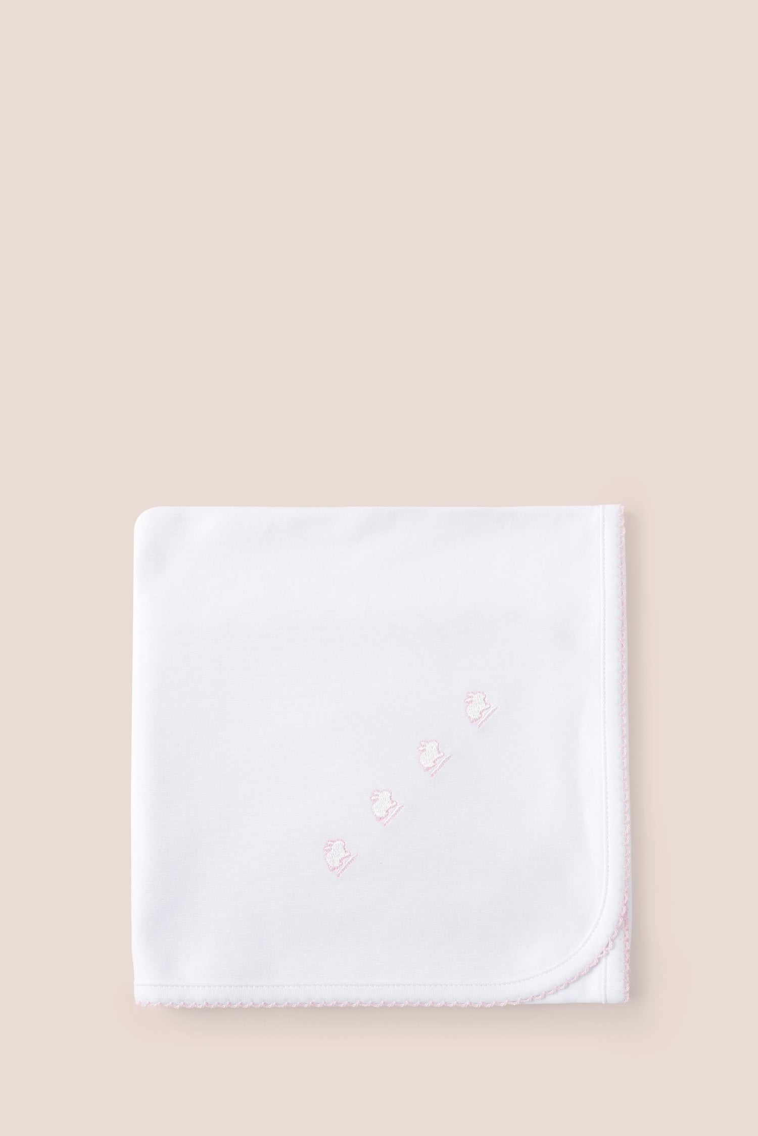 Our plain blanket in double pima cotton is pure quality and durability and whelp keeping your baby's temperature regular! Use it to lay over baby in your arms, in the pram or in the cot. It makes a great gift idea for a new baby or baby shower while combined with our softest pyjamas. Choose from a beautiful array of classic colours: light-blue and white, pink and white or all white. Features our lovely logo embroidered on one side and a delicate picot finish on the edge. Measures: 73 cm x 69 cm