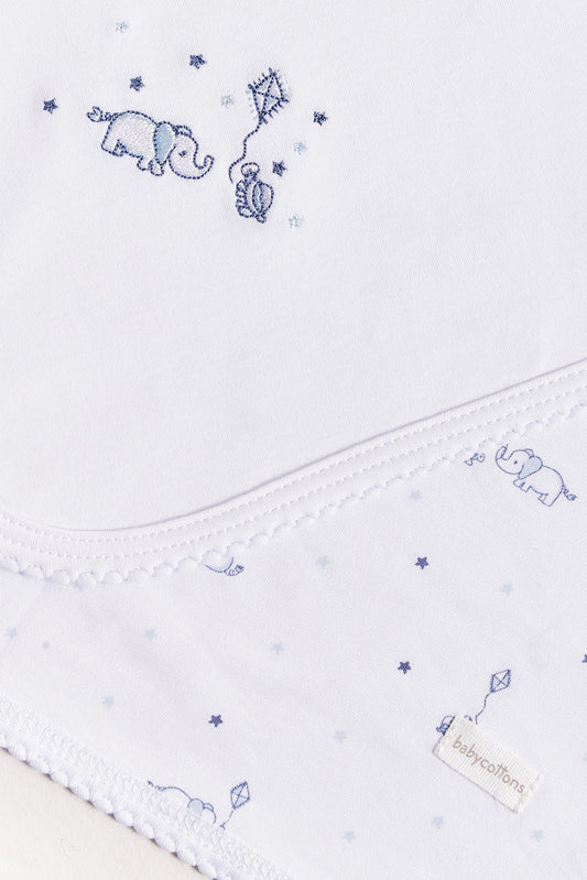 Crafted from super soft Pima cotton, this receiving blanket makes babies first months extra cozy.  The two sided blanket features a sleek white finish with an embroidered of Celine & Bernie, while the other side comes with a full print of our Celine & Bernie collection.  Approximate measures: 73 cm x 69 cm Composition: 100% Peruvian Pima Cotton.  Made in Perú.  Machine washable. 
